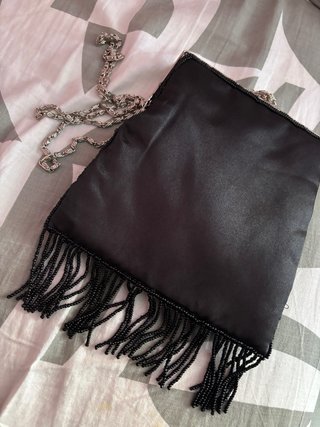 Bolso de fiesta negro con flecos