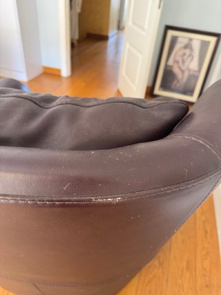 Sillón Natuzzi de cuero marrón