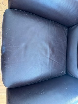 Sillón Natuzzi de cuero marrón