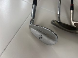 Palos y bolsa de golf año 2000