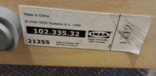 Butaca Ikea gris y madera