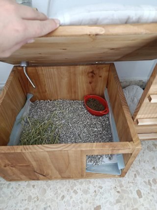 Casita de madera para conejo