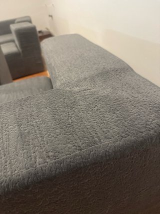 Sofá modular gris tela