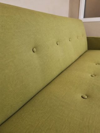 Sofá cama verde de diseño — cómodo y decorativo