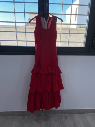 Traje de flamenca rojo con volantes