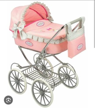 Carrito de muñeca rosa con capota