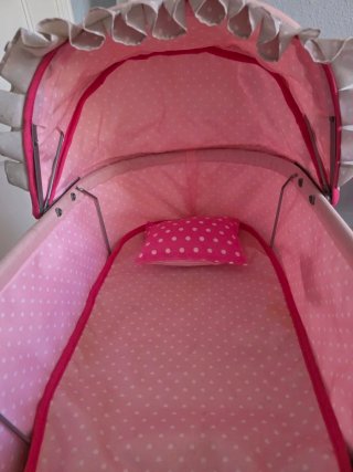Carrito de muñeca rosa con capota