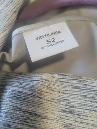 Traje chaqueta  y corpiño de VESTIR  plata/blanco.