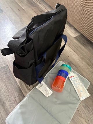 Bolsa Porta Pañales SKIP HOP para carrito bebé.