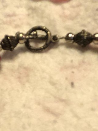 Collana etnica cuore formata da anellini in pietra