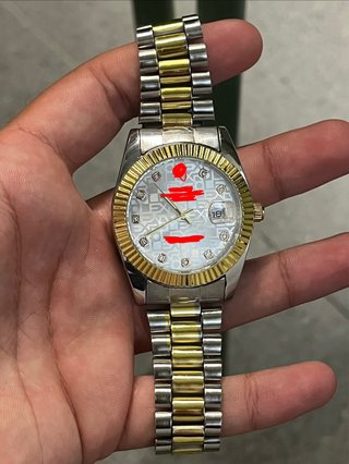 Reloj unisex de oro y plata