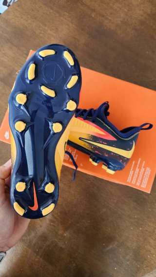 Scarpe da calcio Nike per bambini gialle e blu