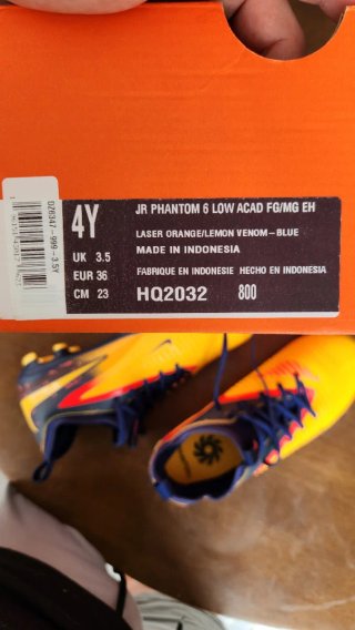 Scarpe da calcio Nike per bambini gialle e blu