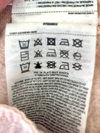 Pantalones Mango MomFit. Color salmón claro. T-36