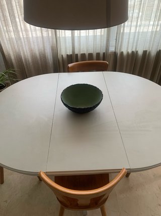 Mesa de comedor oval de madera