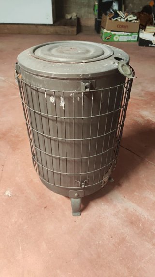 Chimenea leña redonda metal gris