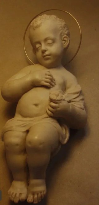 Niño Jesús dormido en paja