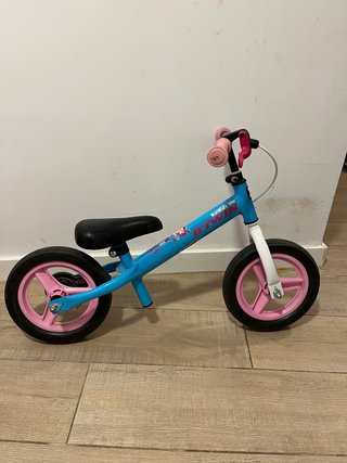 Bicicleta sin pedales Btwin azul y rosa