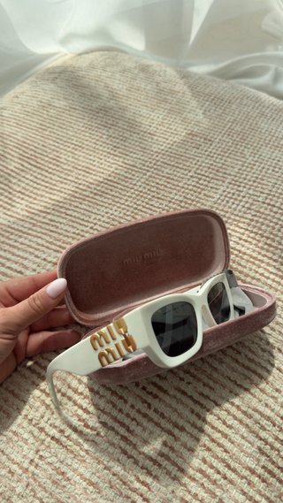 Occhiali da sole Miu Miu SMU09WB5322 bianchi e dorati