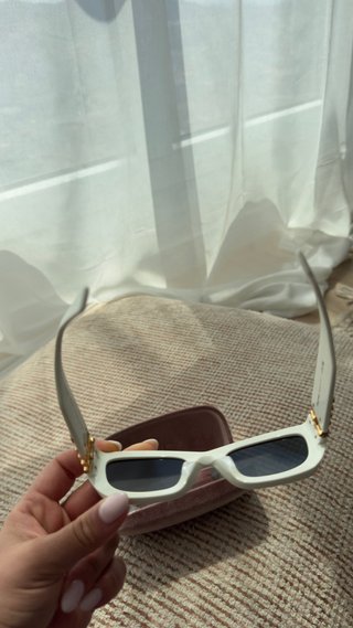 Occhiali da sole Miu Miu SMU09WB5322 bianchi e dorati
