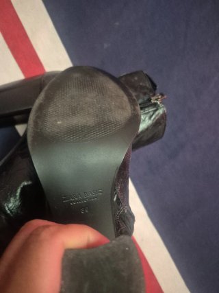 Botas de tacón negras, un solo uso