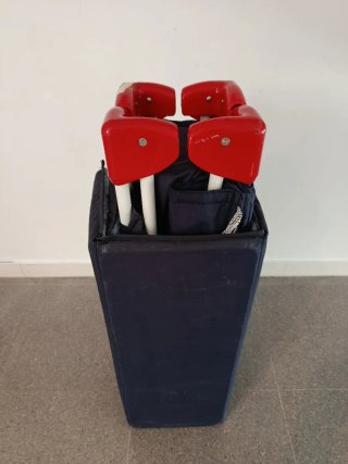 Cuna de viaje azul y roja