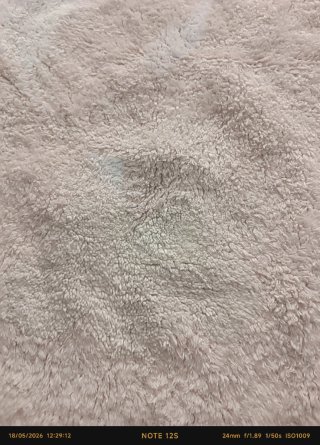 Alfombra beige de tela