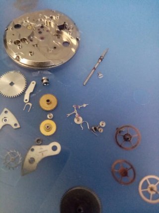 Placa y componentes reloj antiguo