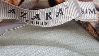 Shorts con cinturón estampado