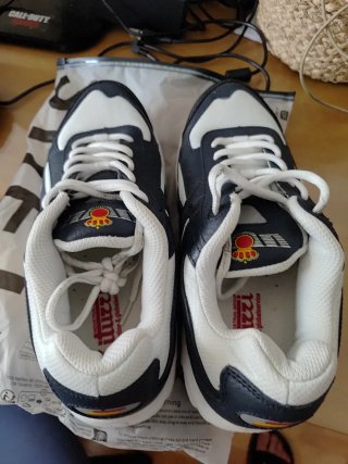 Zapatillas deportivas EA azules y blancas