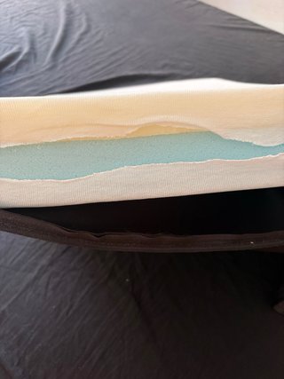 Cojín antiescaras para silla de ruedas.