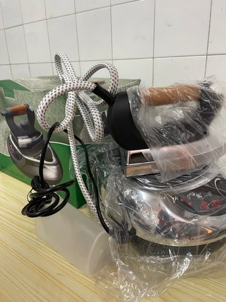 Plancha de vapor con accesorios