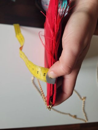 Bolso fiesta antelina rojo con plumas