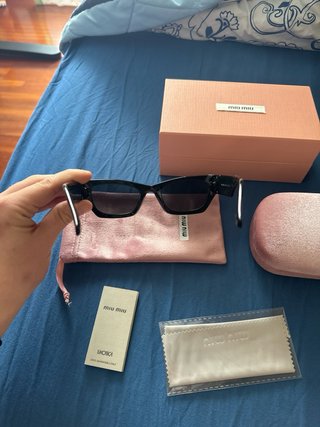 Occhiali Miu Miu Neri