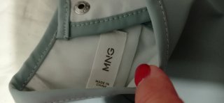 Babero impermeable con monos en bici.Nuevo.