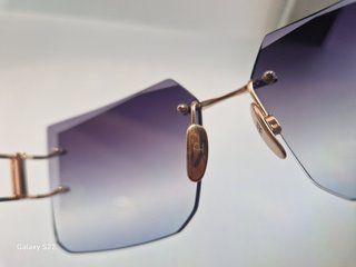 Gafas de sol Ana Hickman doradas y moradas