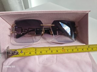 Gafas de sol Ana Hickman doradas y moradas