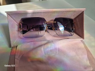 Gafas de sol Ana Hickman doradas y moradas
