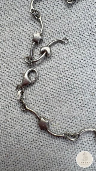 Colgante de plata con corazones y lunas