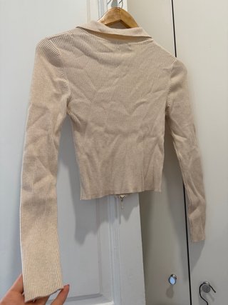 Jersey Stradivarius cremallera cuello polo beige