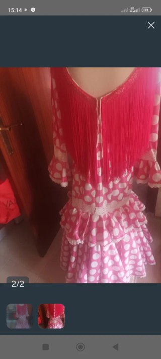Traje de flamenca rosa con lunares blancos