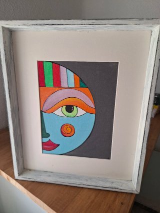 2 Quadri astratti con facce multicolore