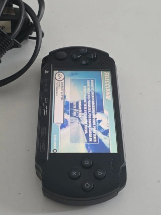 Sony PSP Nera + Caricatore + Gioco