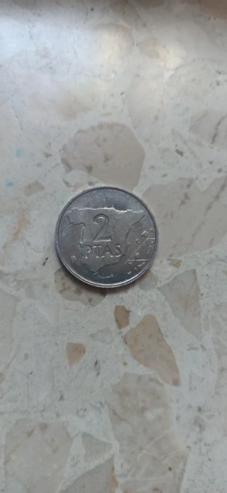 2 kilogramos de monedas de 2 pesetas
