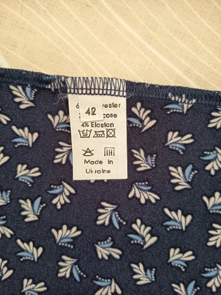 Blusa sin mangas azul y blanca talla 42/L