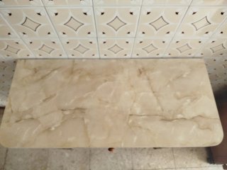 Mesa de cocina extensible de madera y mármol