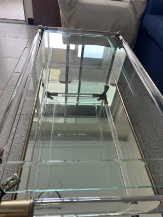 Mesa de centro cristal y metal dorado