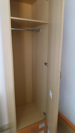 Armario de una puerta con cajones