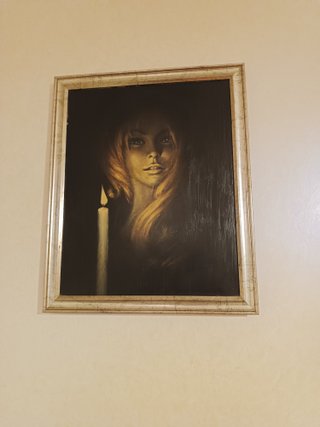 Quadro vintage donna con candela