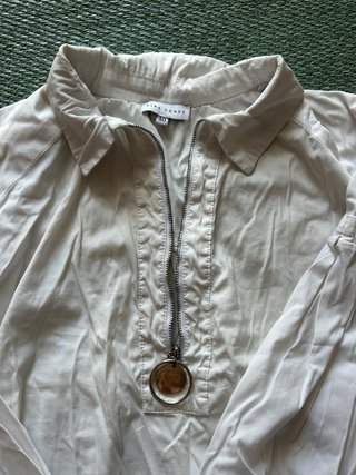 Blusa blanca cremallera